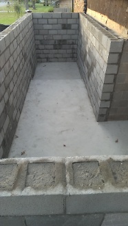 Storm shelter and extra storage under new porch